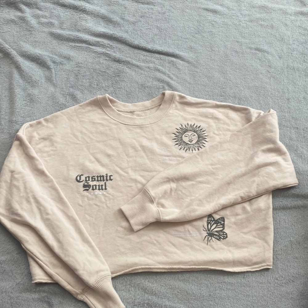 tan coped hoodie with designs